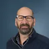 Headshot of David Adelman, CEO
